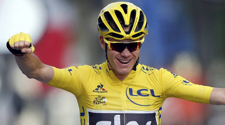 Cycling - Tour de France cycling race - The 113-km (70,4 miles) Stage 21 from Chantilly to Paris, France - 24/07/2016  - Yellow jersey leader Team Sky rider Chris Froome of Britain celebrates with team mates on the finish line.    REUTERS/Jean-Paul Pelissier