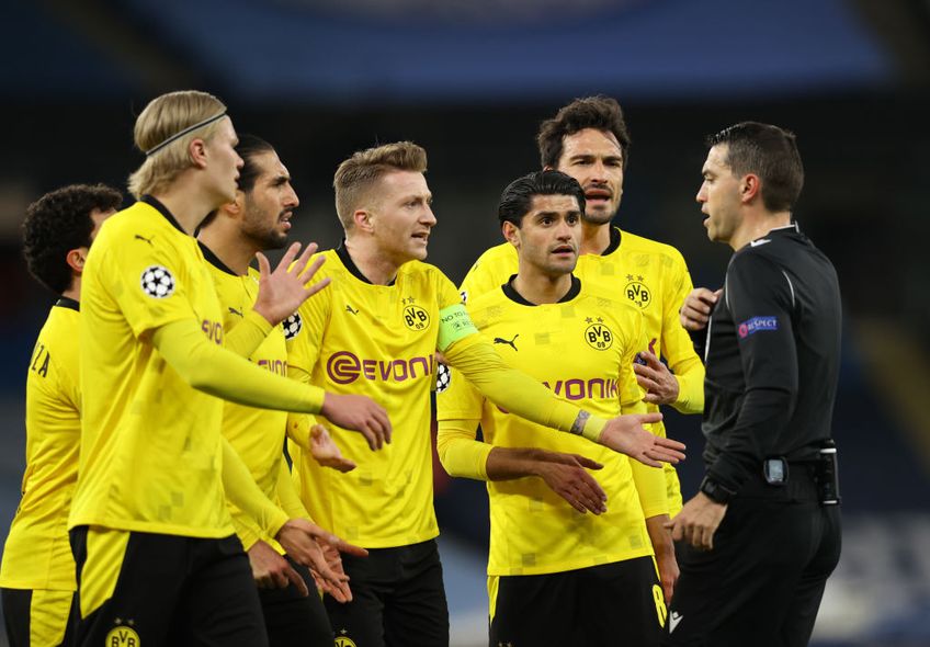 Hațegan și Șovre, în prim-plan, după duelul dintre Manchester City și Dortmund